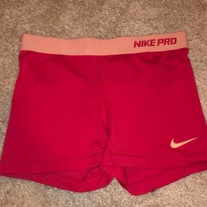 bright fuschia nike’s pros